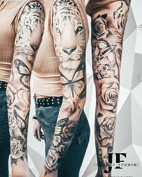 Neat Rose Sleeve Tattoo On Female