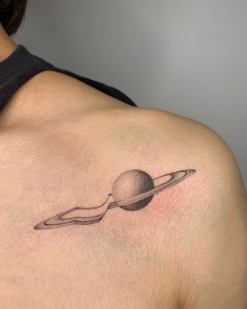 Neat Saturn Tattoo On Female