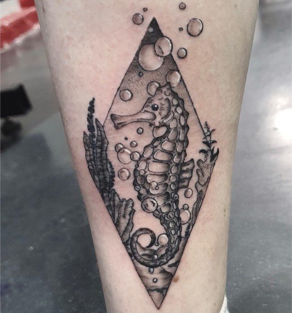 Neat Seahorse Tattoo On Female