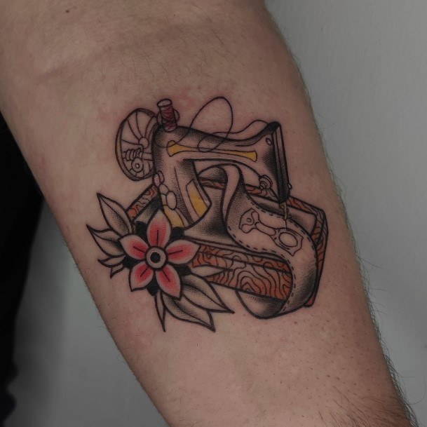 Neat Sewing Machine Tattoo On Female