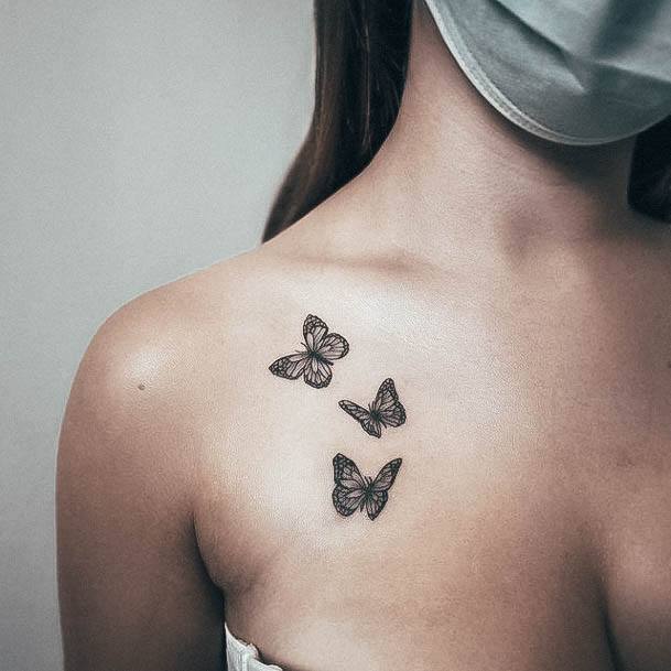 Neat Small Butterfly Tattoo On Female