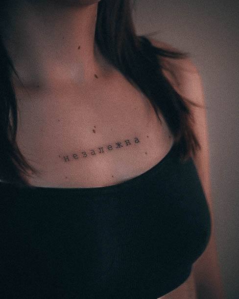 Neat Small Chest Tattoo On Female