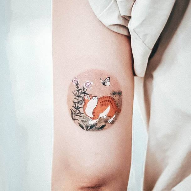 Neat Small Flower Tattoo On Female