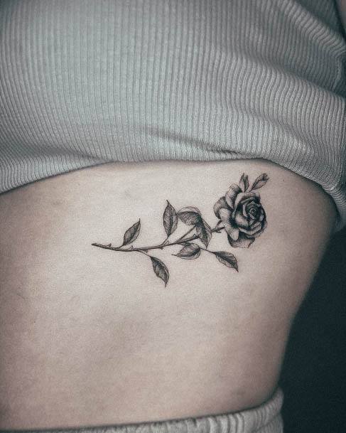 Neat Small Rose Tattoo On Female