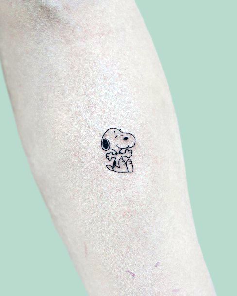 Neat Snoopy Tattoo On Female