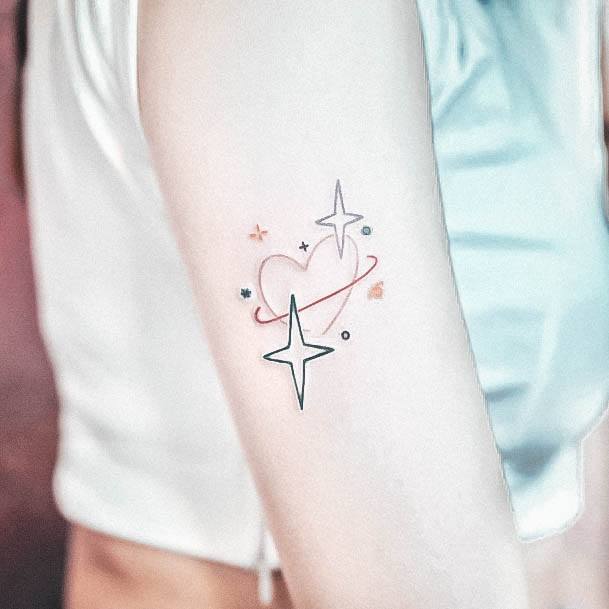 Neat Space Tattoo On Female