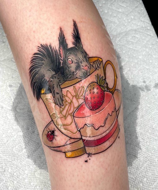 Neat Squirrel Tattoo On Female