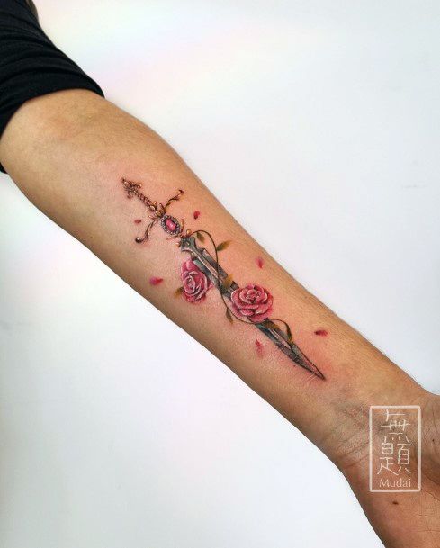 Neat Sword Tattoo On Female