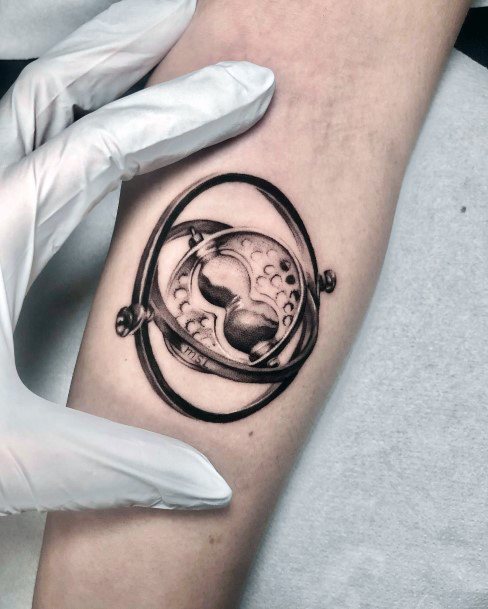 Neat Time Turner Tattoo On Female