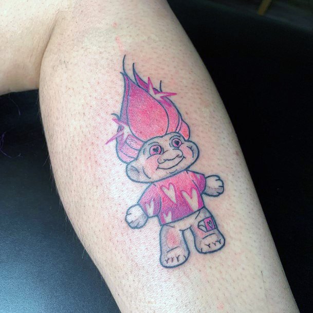 Neat Troll Doll Tattoo On Female