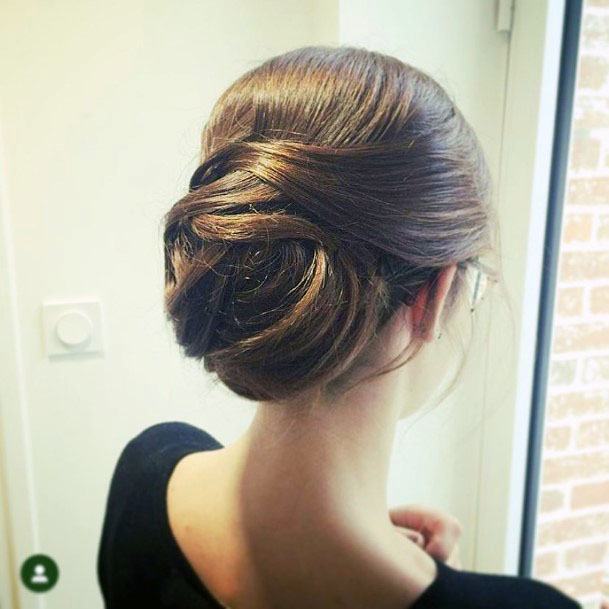 Neat Twisted Chignon Hairstyle For Women