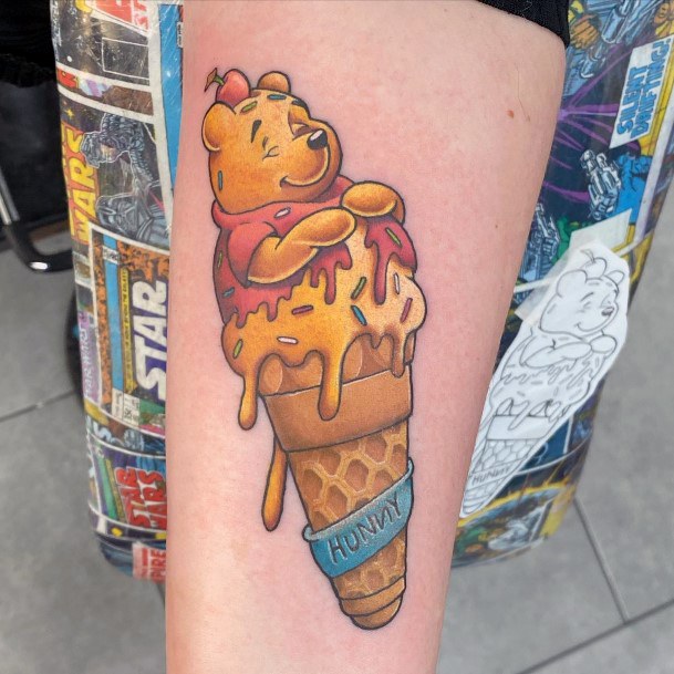 Neat Winnie The Pooh Tattoo On Female