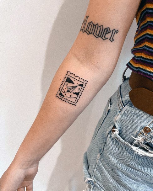 Nice Postage Stamp Tattoos For Women