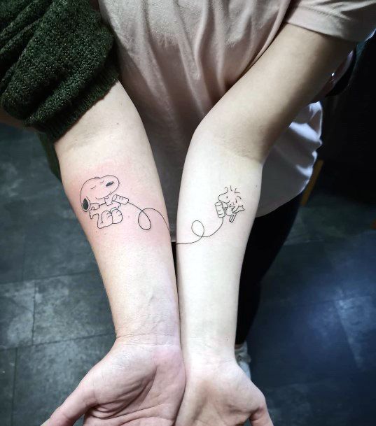 Nice Snoopy Tattoos For Women