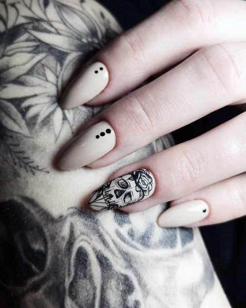 Nude Nails With Spooky Skull Art