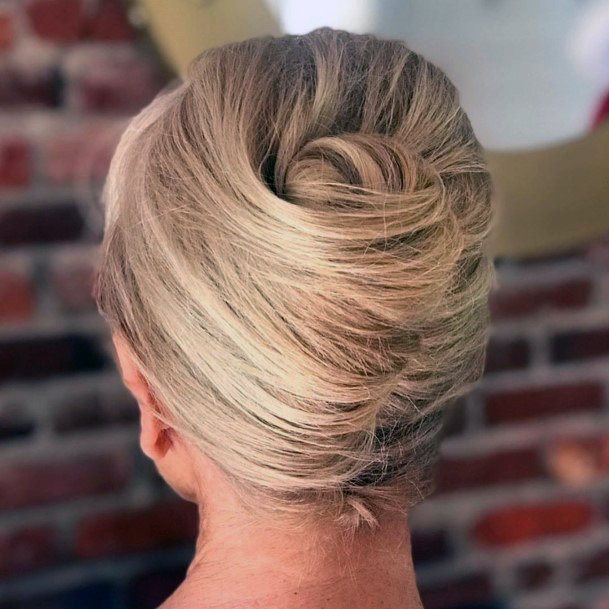 Older Woman With A Classical Tucked French Twist