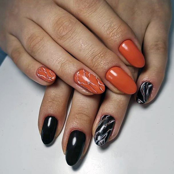 Orange And Black Lightening Design On Nails