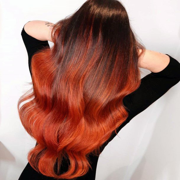 Orange Curly Wavy Cascade Black Shirt Winter Witchcraft Witch Hairstyle Ideas For Women