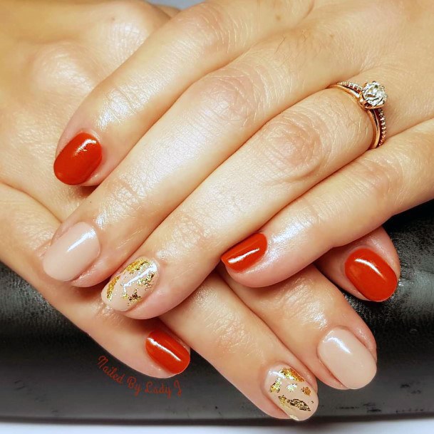 Orange Red Nails With Golden Foils For Women