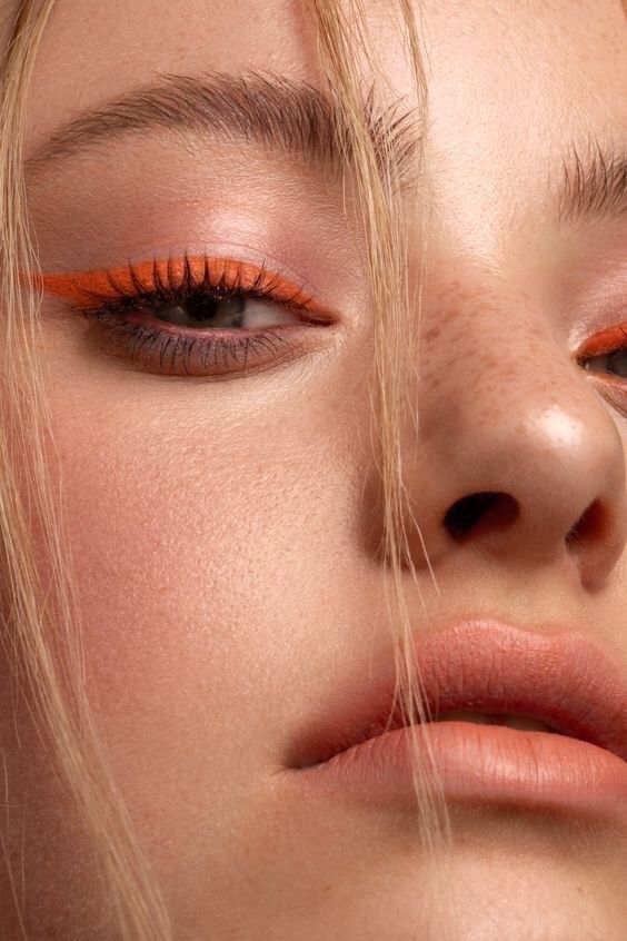 Orange Winged Eyeliner Look Women