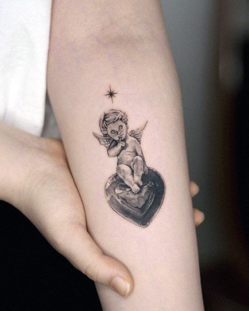 Ornate Tattoos For Females Baby Angel