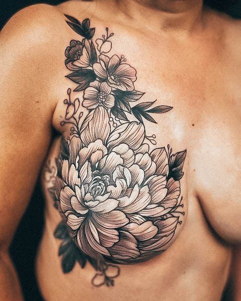 Ornate Tattoos For Females Boob