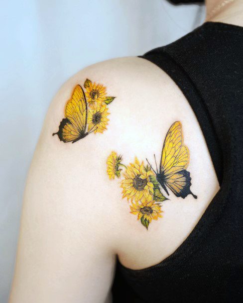 Ornate Tattoos For Females Butterfly Flower