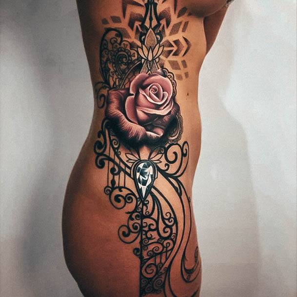 Ornate Tattoos For Females Hip