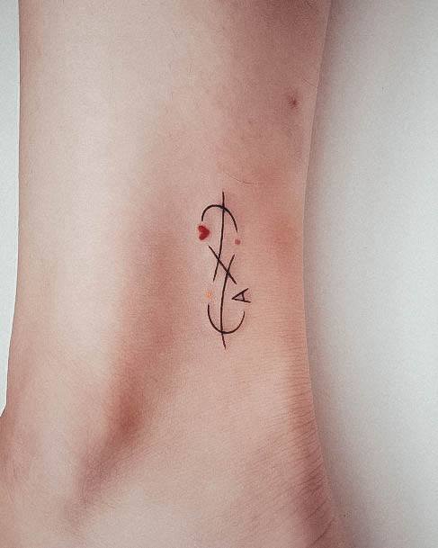 Ornate Tattoos For Females Initials