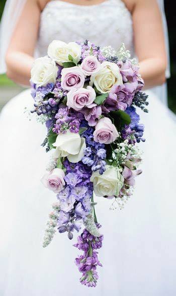 Overflowing Purple Rose Wedding Bouquet