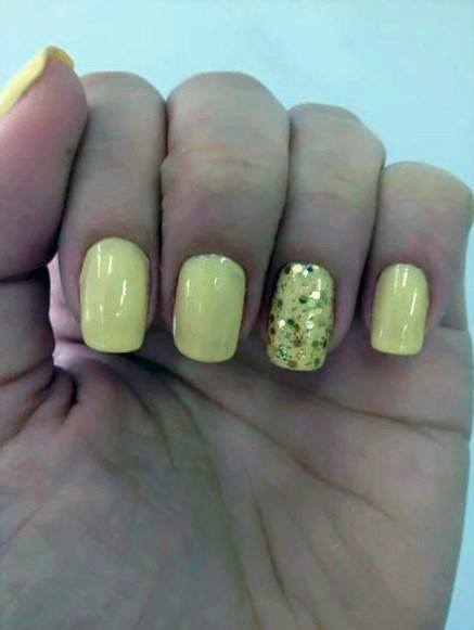 Pale Yellow Nails With Golden Designs For Women