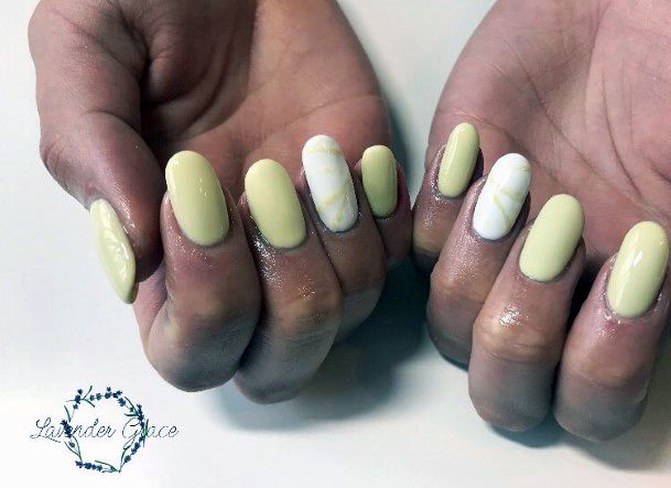 Pale Yellow Nails With White Accent For Women