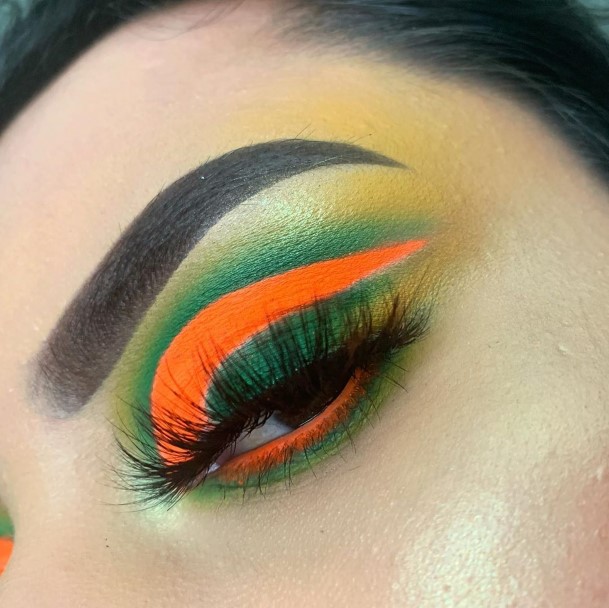 Peacock Green And Orange Neon Eye Makeup Looks For Women