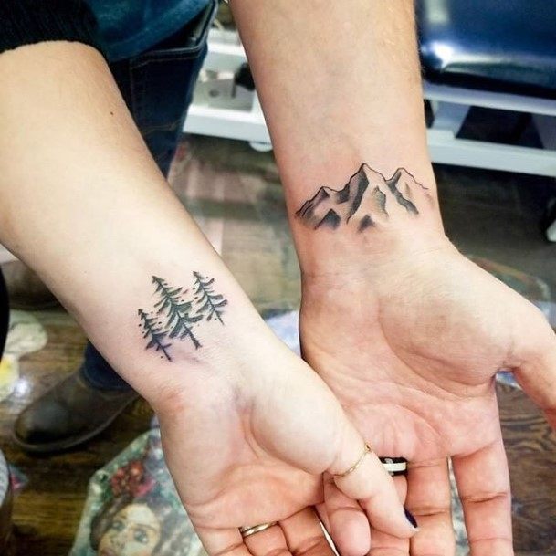 Peaks And Pine Winter Couple Tattoo Wrists