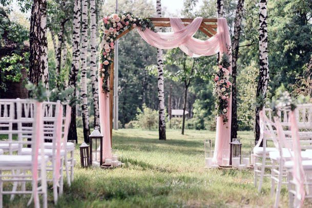 Pink Clothed Wedding Platform And Flowers