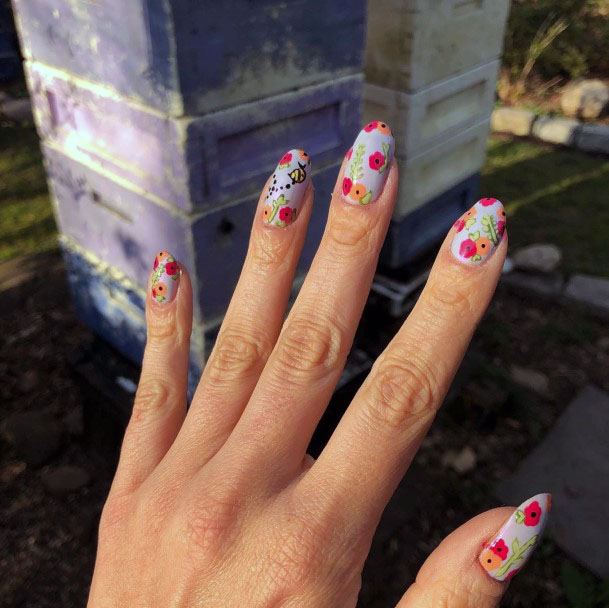 Pink Flowers And Bee Designs On Nails Women