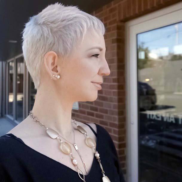 Platinum Blonde Textured And Layered Pixie Cut Womens Hairstyle