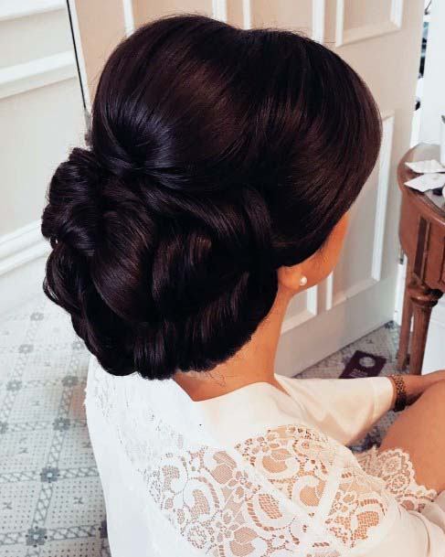 Polished Dark Brunette Sleek And Shiny Updo Womens Hairstyle