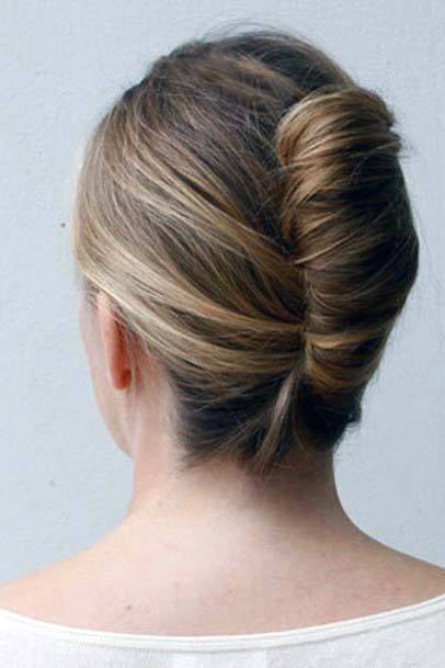 Polished French Styled Brown And Blonde Highlighted Updo Womens Hairstyle