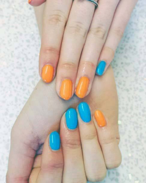 Polished Nails Orange And Blue For Women