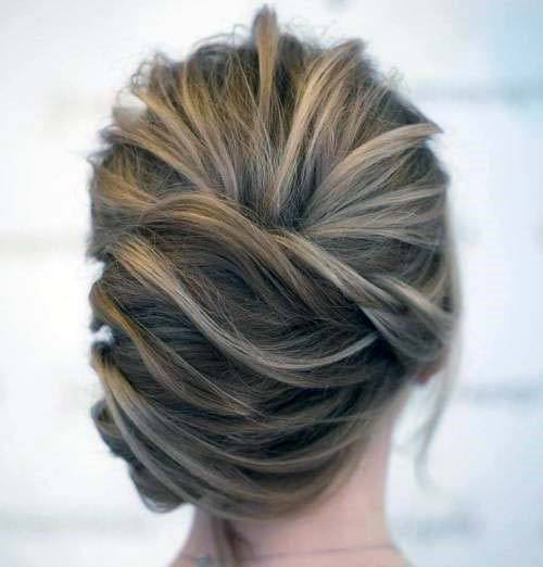 Polished Soft Brown And Blonde Highlighted Updo Womens Hairstyle