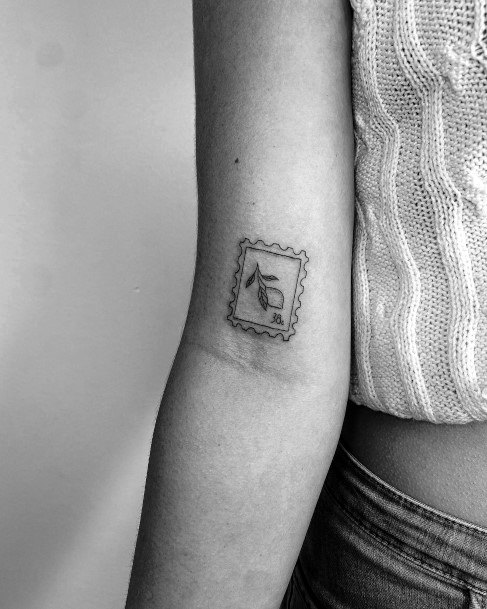 Postage Stamp Female Tattoo Designs