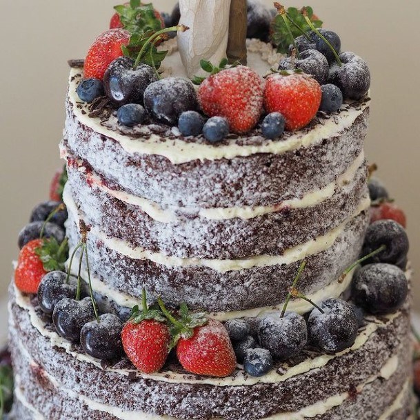 Powdered Sugar And Fruits Chocolate Wedding Cake Semi Naked