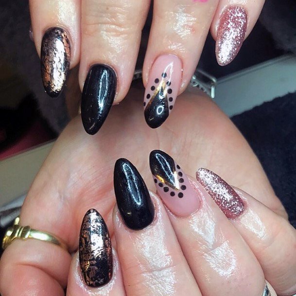 Pretty Black And Gold Nails