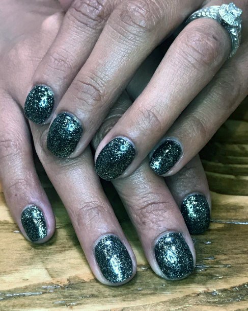 Pretty Black And Silver Sparkly Nails Design For Women