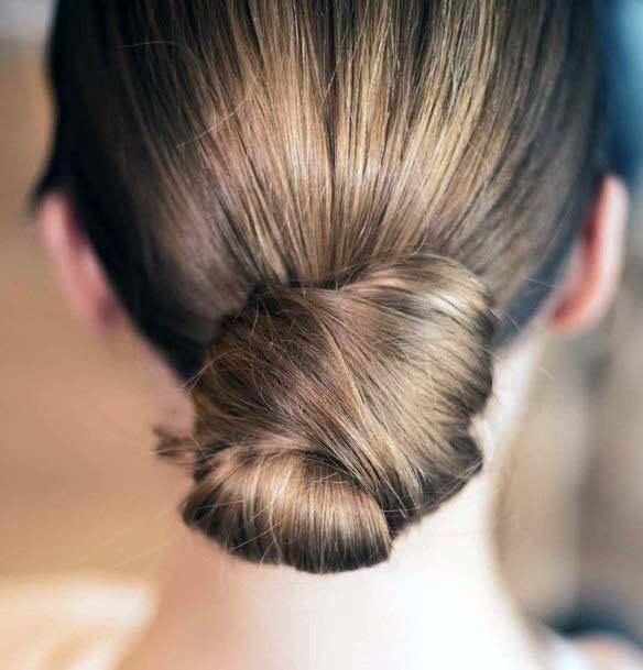 Pretty Brown And Blonde Highlighted Polished Bun Womens Hairstyle Idea