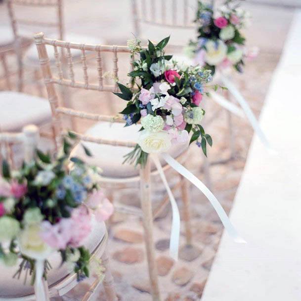 Pretty Colorful Pink Flowers Vibrant Leaves Chair Decoration Wedding Aisle Ideas