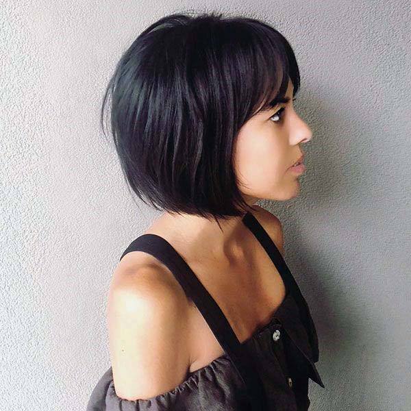 Pretty Girl With Short Black Rounded Hair Modern Hairstyle Ideas