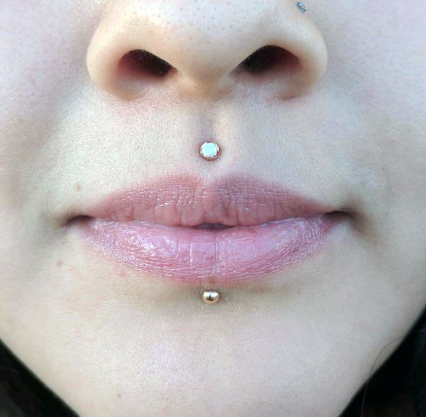 Pretty Polished Gold Labret Stud Piercing And Pearly White Medusa Piercing Ideas For Women