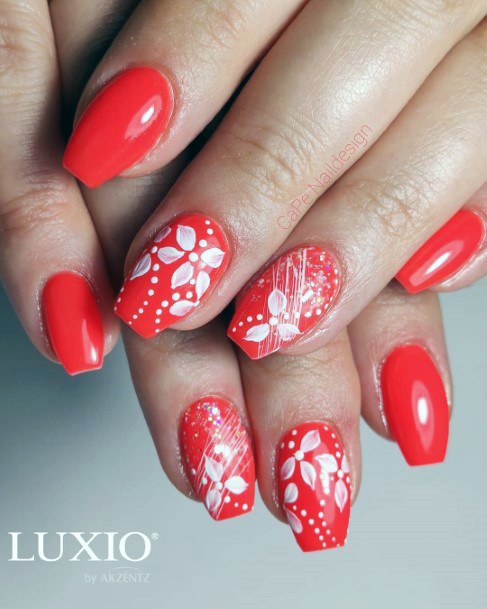 Pretty White Art On Red Orange Nails For Women